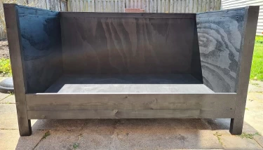 Zwarte hondensofa met hoge rand